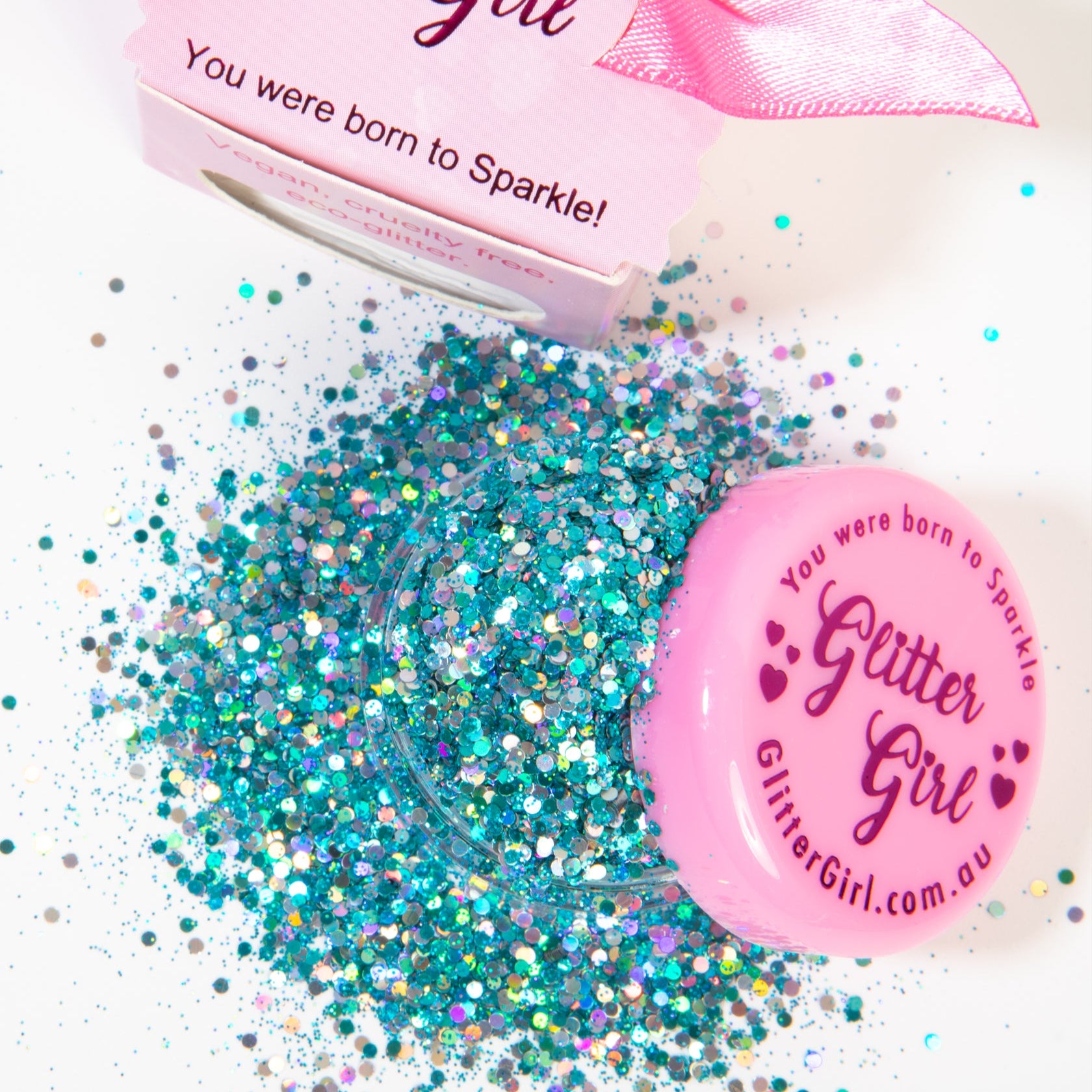 GlitterGirl product with glitter and packaging on a white background