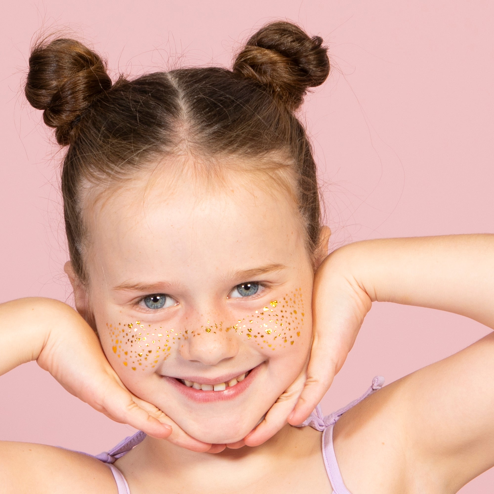 Party Glitter Freckles on the Cheeks of your girl. Close up