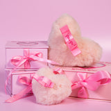 Full-size bronze Stardust Love Heart Shimmer Puff beside the travel-sized baby pink Mini