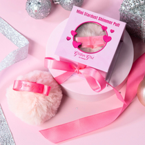 Glitter Girl Mini Stardust Shimmer Puff with rose gold body shimmer