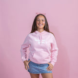 Pink hoodie with white puff print