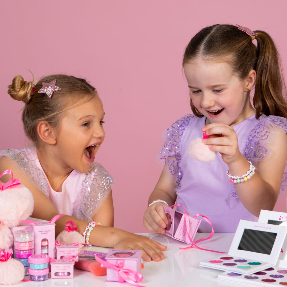 Glitter Girl shimmer puff highlighter, perfect for dance, cheer, festivals, and fun events.