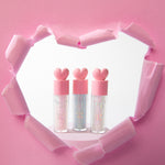 Sparkle Gloss. Trendy teen makeup with pink shimmer lip gloss, enhancing lips with a glossy, lightweight formula.